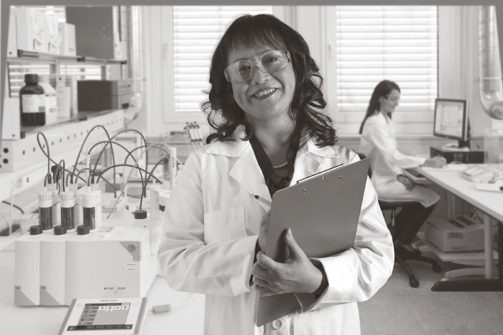 lab manager in a laboratory with another scientist