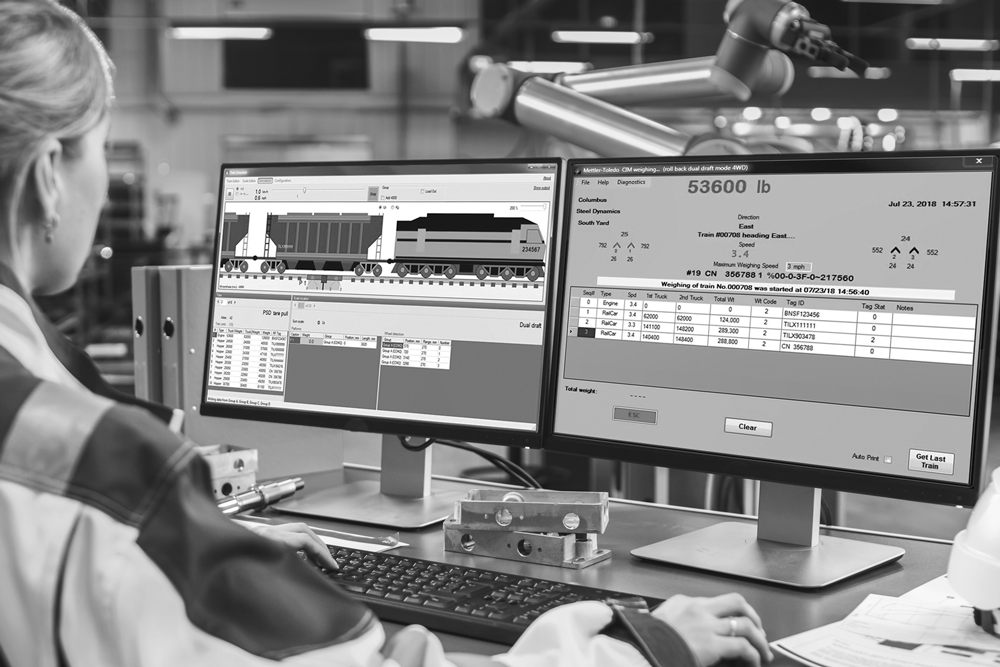 Train in-motion rail scale data being reviewed by technician