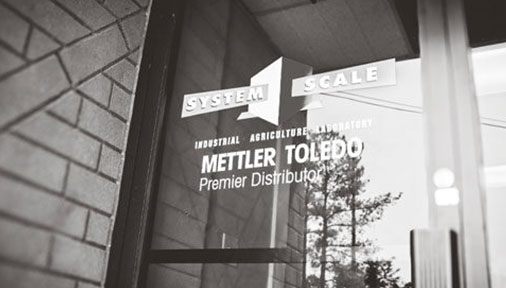 exterior door at system scale office with mettler toledo sticker