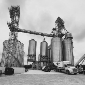 system scale truck in front of silos at farms