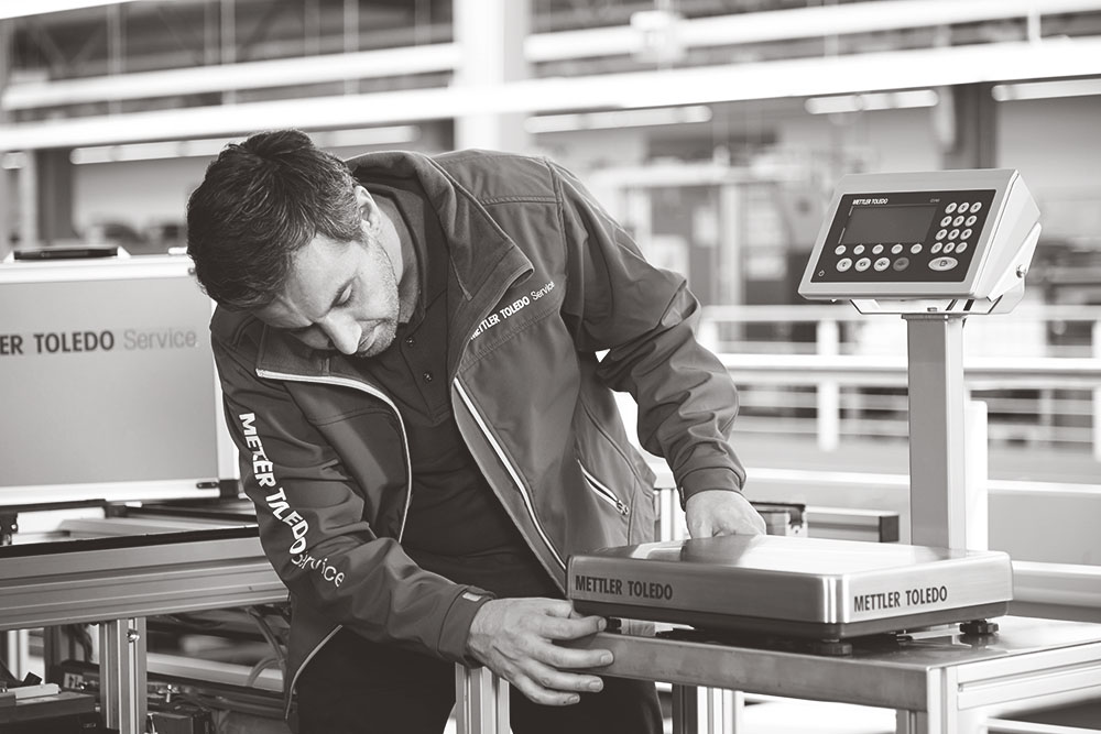METTLER TOLEDO technician providing scale services for a bench scale