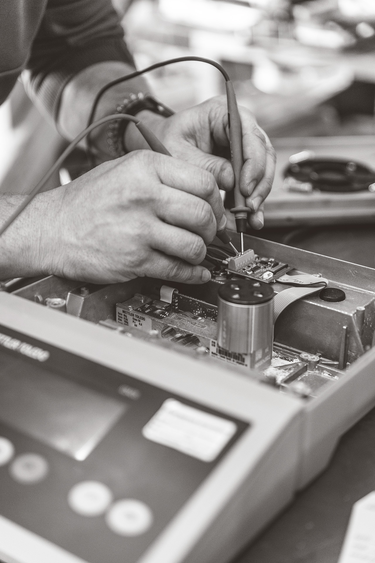 Engineer performing maintenance on an industrial scale