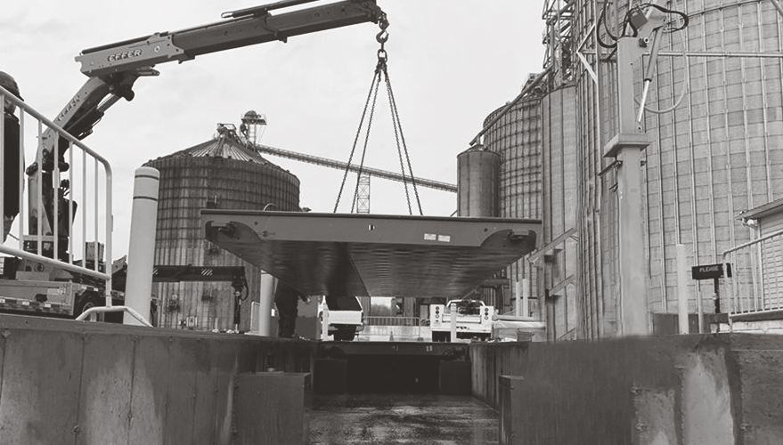 Truck Scale being installed into the foundation.