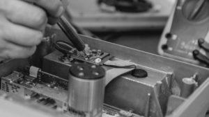 technician using instruments to calibrate scale