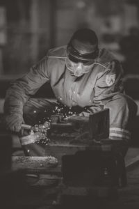welder working on metal