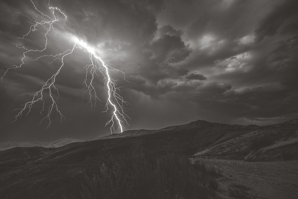 lightning striking in the mountains